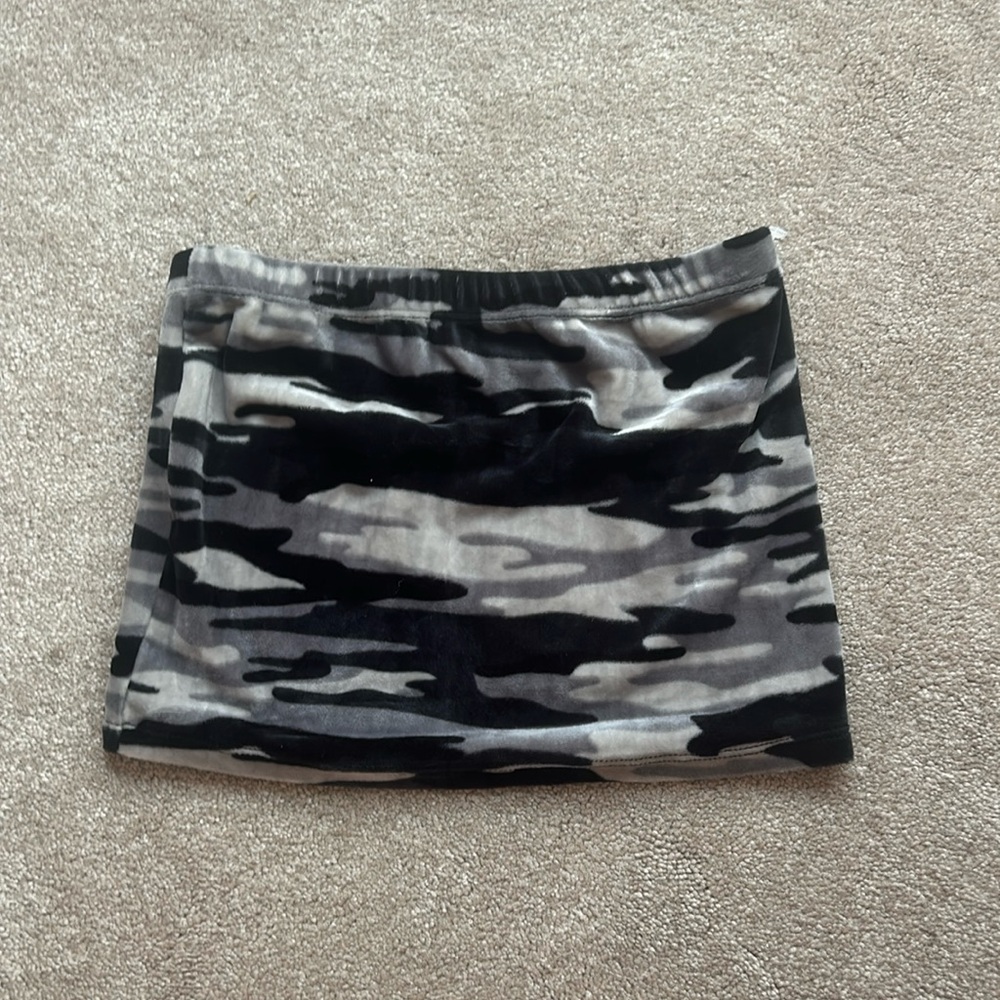 A black, gray, and white tube top.